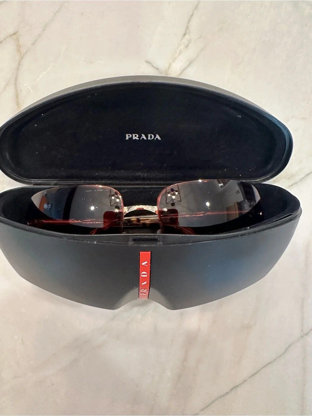 PRADA rimless shield sunglasses